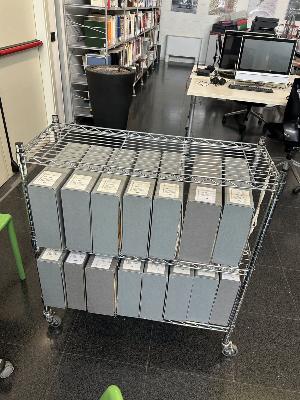 Archive boxes on a cart in a research reading room